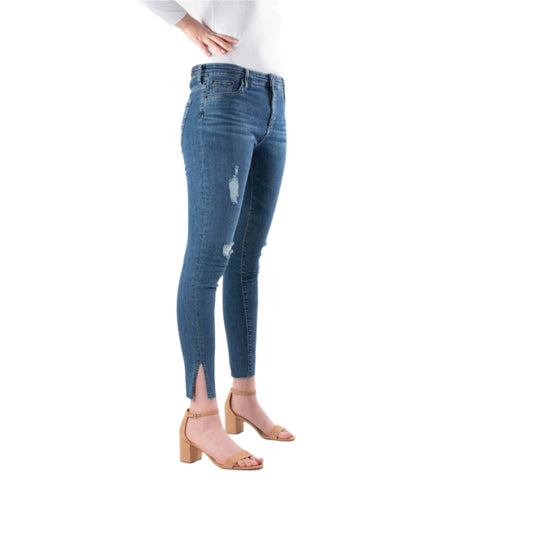 Blue distressed skinny jeans with ankle slits